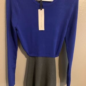 Blue and grey back out mid length dress. New with tags. English factory